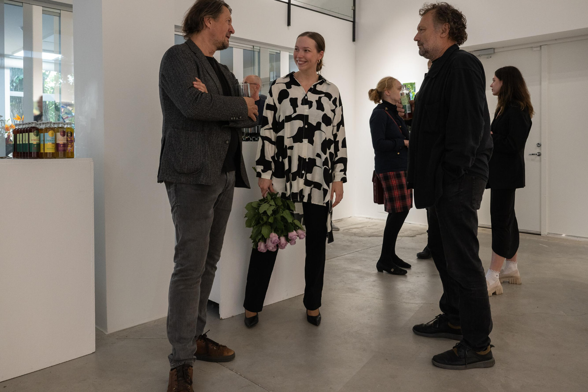 Guests talking at Vaal gallery exhibition opening 2024