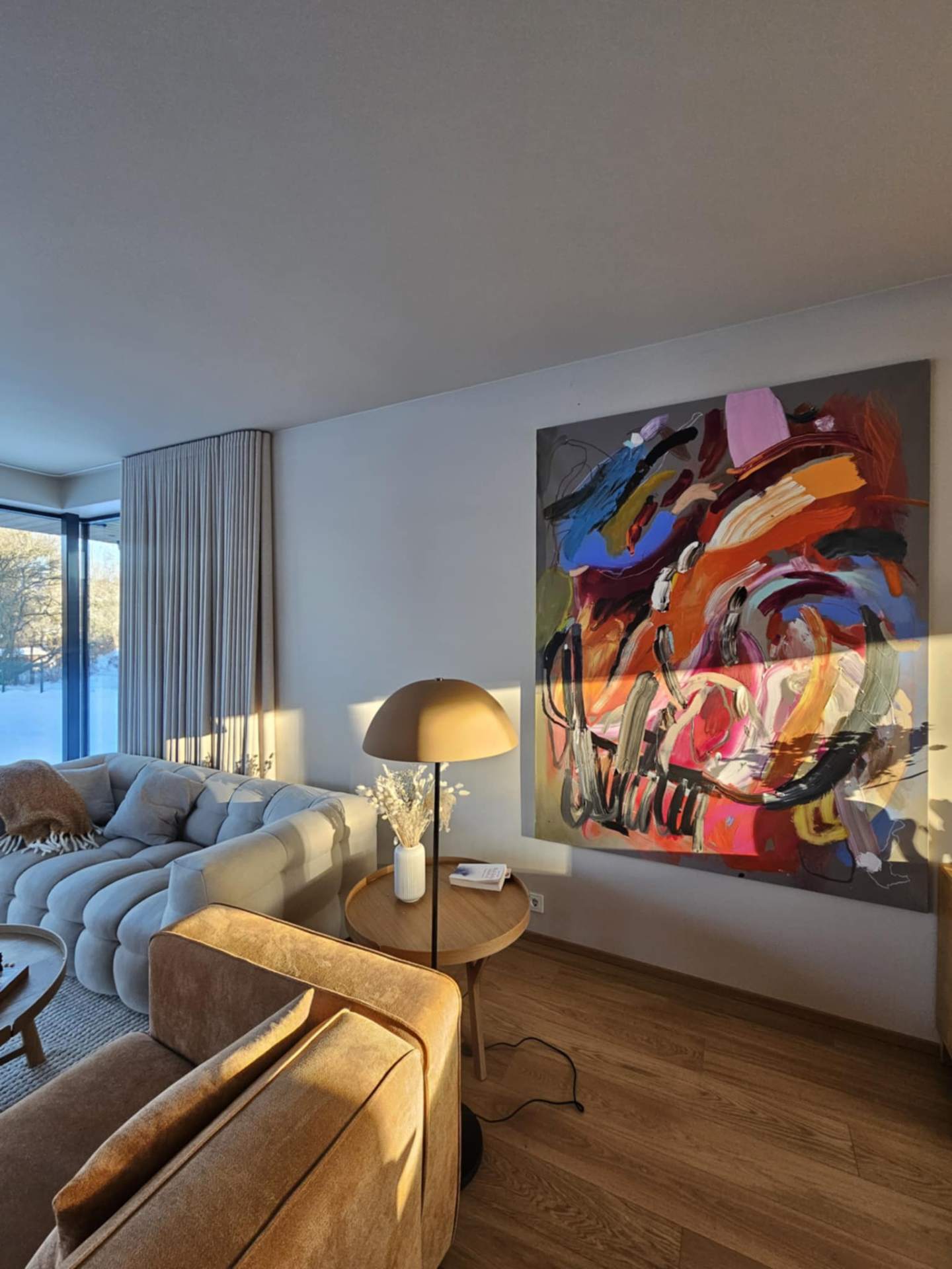 Abstract painting in bright bedroom